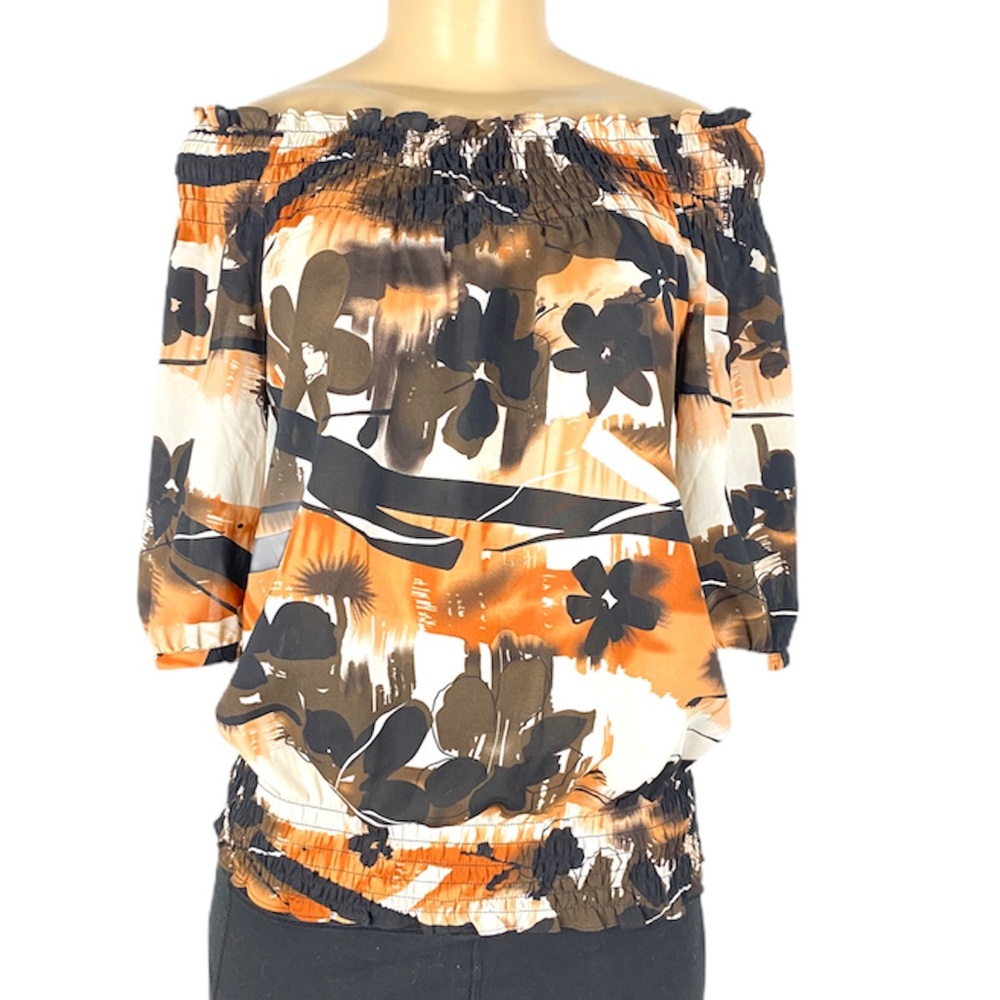 The Limited elastic hem off shoulder flora…